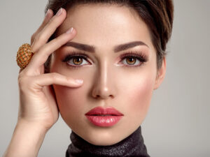 Woman with bright eyes from eyelid lift surgery in La Jolla, CA